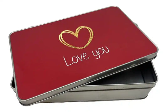 Red tin box with gold heart and 'Love you' text on a white background